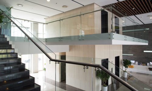 Modern interior design of office building. Empty lobby of condominium building. Two-level house design concept